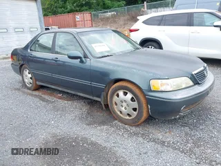 1996 Acura RL with VIN JH4KA9657TC006859, listed as a IAAI auction lot 42780300 with Not provided miles and . Bid and sale history available at DreamBid. Image 1.