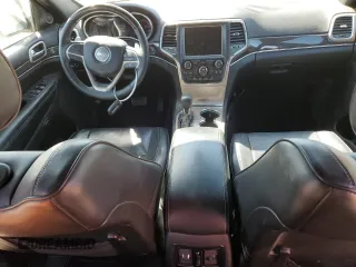 2017 Jeep Grand Cherokee Overland with VIN 1C4RJFCTXHC778491, listed as a Copart auction lot 73944594 with 99,235 mi miles and Clean Title. Bid and sale history available at carsss.com. Image 8.