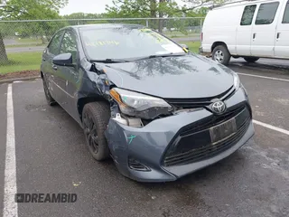 2018 Toyota Corolla L z VIN 2T1BURHE7JC113386, wystawiony jako IAAI lot #42181796 z przebiegiem 104 634 mil mil oraz . Historia ofert i sprzedaży dostępna na DreamBid. Obrazek 1.