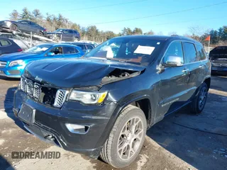 2021 Jeep Grand Cherokee Overland with VIN 1C4RJFCG3MC601150, listed as a IAAI auction lot 41421403 with 165,614 mi miles and . Bid and sale history available at DreamBid. Image 2.