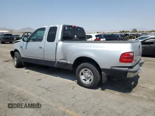 2001 Ford F-150 XL with VIN 1FTRX07L71KA57207, listed as a Copart auction lot 64843825 with Not provided miles and Salvage title. Bid and sale history available at DreamBid. Image 2.