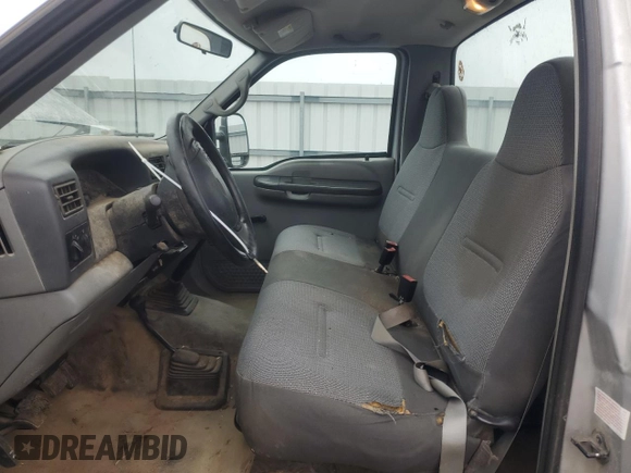 2002 Ford F-350 XL with VIN 1FTSF31F12EB21069, listed as a Copart auction lot 84287374 with 110,890 mi miles and Salvage Title. Bid and sale history available at DreamBid. Image 7.