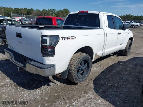 2010 Toyota Tundra 2WD Truck with VIN 5TFRM5F1XAX005420, listed as a IAAI auction lot 41356210 with 253,604 mi miles. Bid and sale history available at carsss.com. Image 4.