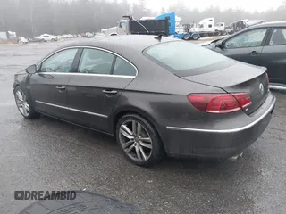 2013 Volkswagen CC Lux with VIN WVWRP7AN5DE554388, listed as a IAAI auction lot 41004116 with 162,457 mi miles. Bid and sale history available at carsss.com. Image 3.