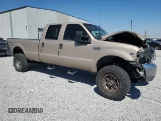 1999 Ford F-350 XL with VIN 1FTSW31S0XEC29624, listed as a Copart auction lot 70879344 with 151,680 mi miles and Salvage title. Bid and sale history available at DreamBid. Image 4.