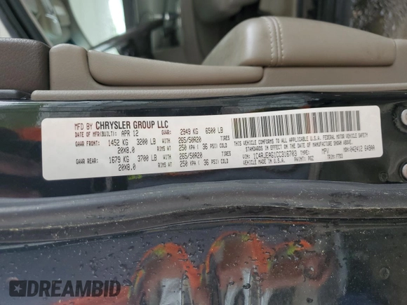 2012 Jeep Grand Cherokee Laredo with VIN 1C4RJEAG1CC316703, listed as a Copart auction lot 52128105 with 203,896 mi miles and Salvage Title. Bid and sale history available at carsss.com. Image 13.