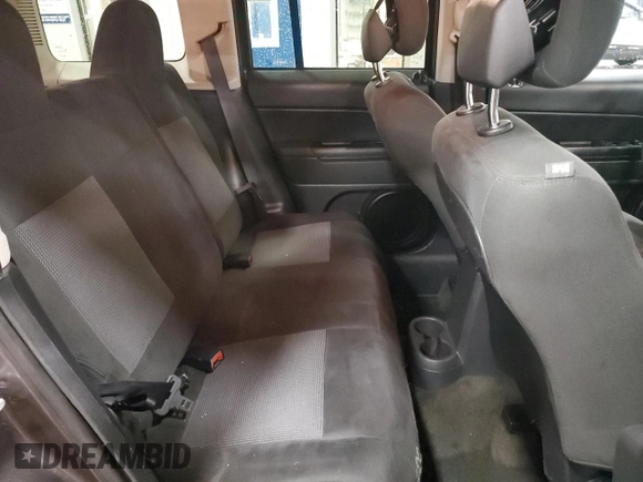 2016 Jeep Patriot High Altitude with VIN 1C4NJRFB5GD697474, listed as a Copart auction lot 57881215 with 152,127 mi miles and Salvage title. Bid and sale history available at DreamBid. Image 11.