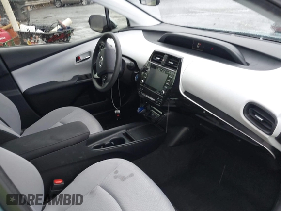 2022 Toyota Prius L Eco with VIN JTDKAMFU4N3158998, listed as a IAAI auction lot 42625041 with 43,033 mi miles and . Bid and sale history available at DreamBid. Image 5.