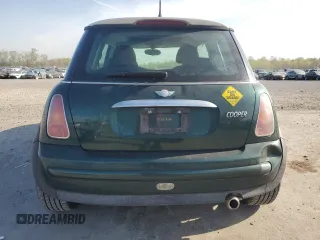 2004 MINI Hardtop with VIN WMWRC334X4TJ61391, listed as a Copart auction lot 53735615 with 103,974 mi miles and Salvage Title. Bid and sale history available at DreamBid. Image 6.