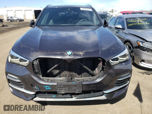 2021 BMW X5 xDrive45e with VIN 5UXTA6C01M9H62393, listed as a Copart auction lot 47083315 with 66,910 mi miles and Salvage title. Bid and sale history available at DreamBid. Image 5.