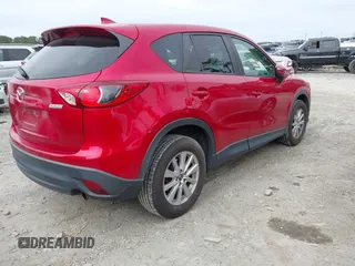 2016 Mazda CX-5 Touring z VIN JM3KE2CY3G0894441, wystawiony jako IAAI lot #41508767 z przebiegiem 88 554 mil mil oraz . Historia ofert i sprzedaży dostępna na DreamBid. Obrazek 4.