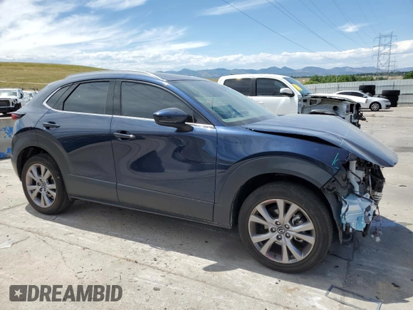 2022 Mazda CX-30 S Premium with VIN 3MVDMBDL9NM446527, listed as a Copart auction lot 63291275 with 17,035 mi miles and Salvage title. Bid and sale history available at DreamBid. Image 4.