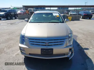 2005 Cadillac STS z VIN 1G6DC67A950171835, wystawiony jako IAAI lot #41599105 z przebiegiem 74 235 mil mil oraz . Historia ofert i sprzedaży dostępna na DreamBid. Obrazek 12.