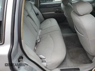 1997 Lincoln Town Car Executive z VIN 1LNLM81W1VY719314, wystawiony jako Copart lot #73950324 z przebiegiem Nie podano mil oraz Szkody całkowita. Historia ofert i sprzedaży dostępna na DreamBid. Obrazek 10.