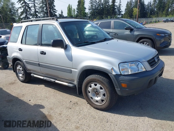1999 Honda CR-V LX with VIN JHLRD1840XC057285, listed as a IAAI auction lot 42126071 with 99,000 mi miles. Bid and sale history available at carsss.com. Image 1.