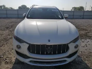 2019 Maserati Levante GranLusso z VIN ZN661XUL7KX318713, wystawiony jako Copart lot #57269795 z przebiegiem 117 095 mil mil oraz Tytuł czysty. Historia ofert i sprzedaży dostępna na DreamBid. Obrazek 5.