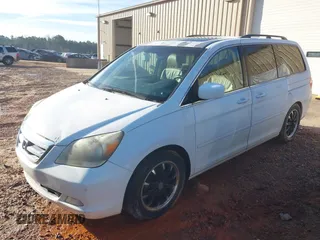 2007 Honda Odyssey Touring с VIN 5FNRL38897B088701, выставлен на аукционе IAAI как лот 41077802 с пробегом 235 821 миль миль и . История ставок и продаж доступна на DreamBid. Изображение 2.