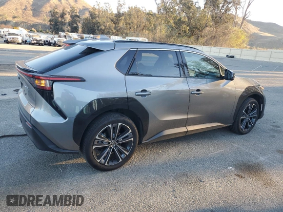 2023 Toyota bZ4X XLE with VIN JTMAAAAAXPA019772, listed as a Copart auction lot 85053124 with 9,591 mi miles and Salvage Title. Bid and sale history available at DreamBid. Image 3.