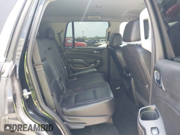 2018 Chevrolet Tahoe LT with VIN 1GNSCBKC9JR133640, listed as a IAAI auction lot 42542381 with 130,154 mi miles and . Bid and sale history available at DreamBid. Image 8.