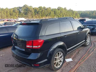 2015 Dodge Journey SXT with VIN 3C4PDCBG7FT556929, listed as a IAAI auction lot 42664149 with 191,980 mi miles and . Bid and sale history available at DreamBid. Image 4.