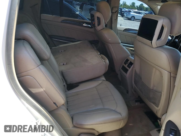2013 Mercedes-Benz GL 450 z VIN 4JGDF7CE4DA166257, wystawiony jako Copart lot #58972195 z przebiegiem Nie podano mil oraz Czysty tytuł • Clean title. Historia ofert i sprzedaży dostępna na DreamBid. Obrazek 11.