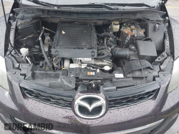 2010 Mazda CX-7 Grand Touring z VIN JM3ER4W32A0338657, wystawiony jako IAAI lot #41207462 z przebiegiem 257 713 mil mil oraz . Historia ofert i sprzedaży dostępna na DreamBid. Obrazek 10.