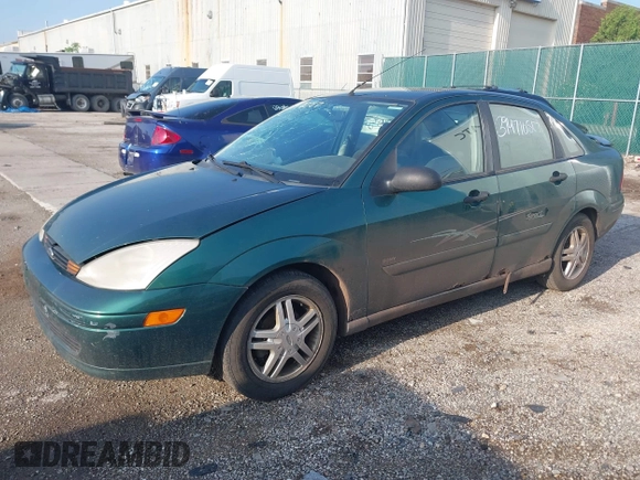2000 Ford Focus SE with VIN 1FAFP3431YW273376, listed as a IAAI auction lot 39471057 with 214,968 mi miles and . Bid and sale history available at carsss.com. Image 2.