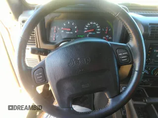 2003 Jeep Wrangler Sport with VIN 1J4FA49S53P365363, listed as a IAAI auction lot 41818320 with 154,567 mi miles. Bid and sale history available at carsss.com. Image 6.