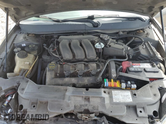 2005 Mercury Sable LS z VIN 1MEFM55S75A619345, wystawiony jako Copart lot #55858325 z przebiegiem Nie podano mil oraz Szkoda całkowita • Salvage title. Historia ofert i sprzedaży dostępna na DreamBid. Obrazek 11.