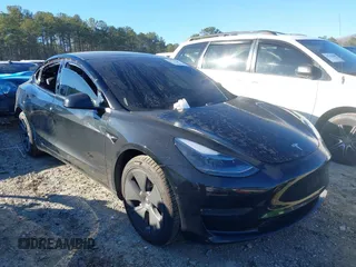 2022 Tesla Model 3 with VIN 5YJ3E1EA9NF147836, listed as a IAAI auction lot 41363603 with 28,748 mi miles. Bid and sale history available at carsss.com. Image 13.