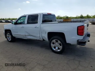 2014 Chevrolet Silverado 1500 LTZ with VIN 3GCPCSEJ3EG327241, listed as a Copart auction lot 52722815 with 174,843 mi miles and Salvage Title. Bid and sale history available at DreamBid. Image 2.