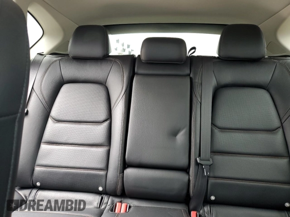 2019 Mazda CX-5 Grand Touring with VIN JM3KFBDM4K0676946, listed as a Copart auction lot 61040465 with Not provided miles and Salvage title. Bid and sale history available at DreamBid. Image 10.