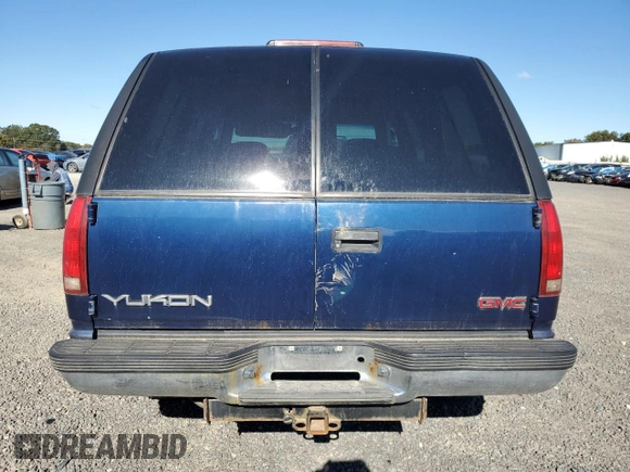 1999 GMC Yukon with VIN 1GKEK13R3XJ757466, listed as a Copart auction lot 75750884 with 270,768 mi miles and Salvage Title. Bid and sale history available at carsss.com. Image 6.