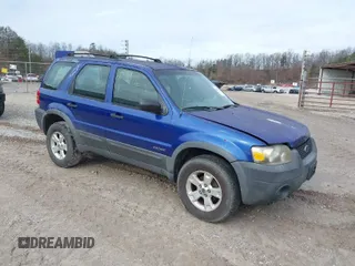 2006 Ford Escape XLT with VIN 1FMYU03146KB87070, listed as a IAAI auction lot 41451676 with 180,415 mi miles. Bid and sale history available at carsss.com. Image 1.