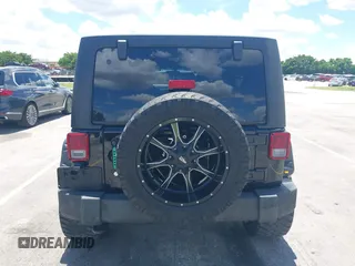 2016 Jeep Wrangler Unlimited Sport z VIN 1C4BJWDG4GL327638, wystawiony jako IAAI lot #42494615 z przebiegiem 139 371 mil mil oraz . Historia ofert i sprzedaży dostępna na DreamBid. Obrazek 16.