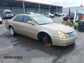 2006 Cadillac DTS 1SC z VIN 1G6KD57Y06U167548, wystawiony jako IAAI lot #42103269 z przebiegiem 194 952 mil mil oraz . Historia ofert i sprzedaży dostępna na DreamBid. Obrazek 1.
