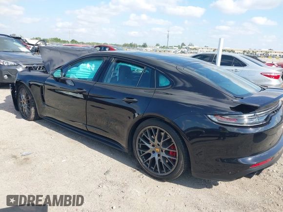 2021 Porsche Panamera GTS with VIN WP0AG2A74ML147997, listed as a IAAI auction lot 42103486 with 10,517 mi miles and . Bid and sale history available at DreamBid. Image 3.