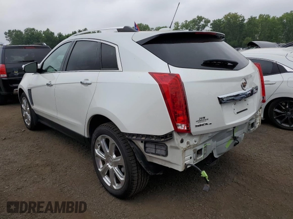 2015 Cadillac SRX Premium Collection with VIN 3GYFNGE32FS528514, listed as a Copart auction lot 61222534 with 104,433 mi miles and Salvage Title. Bid and sale history available at carsss.com. Image 2.