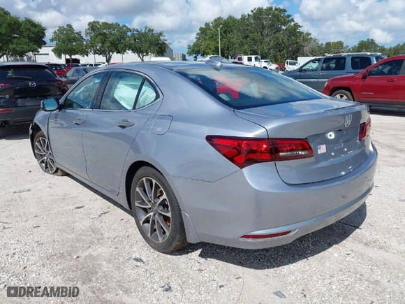 2015 Acura TLX V6 Tech with VIN 19UUB2F59FA005003, listed as a IAAI auction lot 40142940 with 1 mi miles. Bid and sale history available at carsss.com. Image 3.