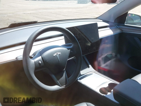 2024 Tesla Model Y Long Range with VIN 7SAYGAEE4RF078906, listed as a IAAI auction lot 42051207 with Not Provided miles and . Bid and sale history available at DreamBid. Image 17.