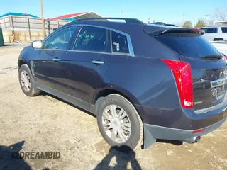 2015 Cadillac SRX with VIN 3GYFNAE35FS608595, listed as a IAAI auction lot 41282751 with 127,055 mi miles and . Bid and sale history available at DreamBid. Image 3.