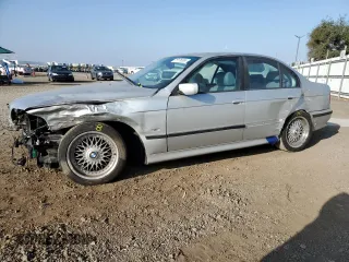 2000 BMW 5 Series 528iA with VIN WBADM6345YGU29738, listed as a Copart auction lot 75176334 with 160,821 mi miles and Salvage Title. Bid and sale history available at carsss.com. Image 1.