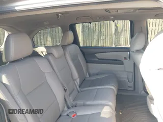 2014 Honda Odyssey Touring with VIN 5FNRL5H95EB108427, listed as a IAAI auction lot 39992643 with 100,658 mi miles and . Bid and sale history available at DreamBid. Image 8.