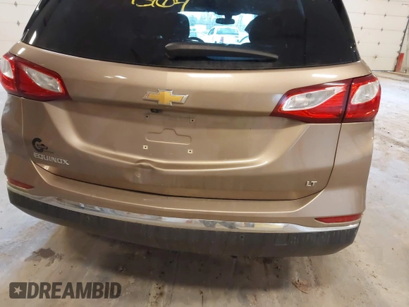 2018 Chevrolet Equinox LT with VIN 2GNAXJEV5J6232085, listed as a IAAI auction lot 41913104 with 112,938 mi miles and . Bid and sale history available at DreamBid. Image 6.