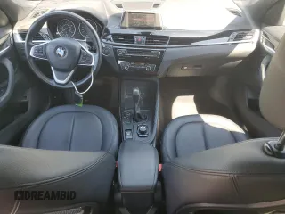 2018 BMW X1 sDrive28i z VIN WBXHU7C37J5H44758, wystawiony jako Copart lot #50888735 z przebiegiem 95 143 mil mil oraz Szkody całkowita. Historia ofert i sprzedaży dostępna na DreamBid. Obrazek 8.