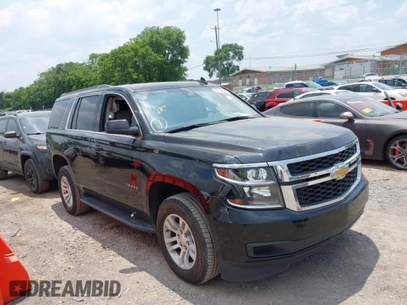 2019 Chevrolet Tahoe LT z VIN 1GNSKBKC5KR388869, wystawiony jako IAAI lot #42354451 z przebiegiem 111 359 mil mil oraz . Historia ofert i sprzedaży dostępna na DreamBid. Obrazek 1.