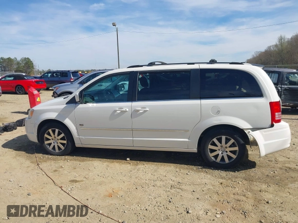 2009 Chrysler Town & Country Touring with VIN 2A8HR54X89R642118, listed as a IAAI auction lot 41844247 with 161,651 mi miles and . Bid and sale history available at DreamBid. Image 14.