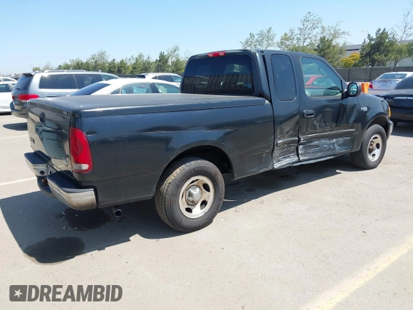 2003 Ford F-150 XL with VIN 1FTRX17213NB70553, listed as a IAAI auction lot 41946968 with 186,683 mi miles. Bid and sale history available at carsss.com. Image 13.