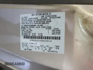 2003 Ford Windstar LX z VIN 2FMZA51423BA33048, wystawiony jako Copart lot #73987964 z przebiegiem 121 411 mil mil oraz Szkoda całkowita • Salvage title. Historia ofert i sprzedaży dostępna na DreamBid. Obrazek 13.