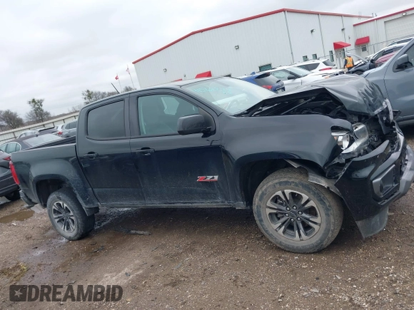 2021 Chevrolet Colorado 2WD Z71 with VIN 1GCGSDEN3M1108777, listed as a IAAI auction lot 41562874 with 77,607 mi miles and . Bid and sale history available at DreamBid. Image 13.